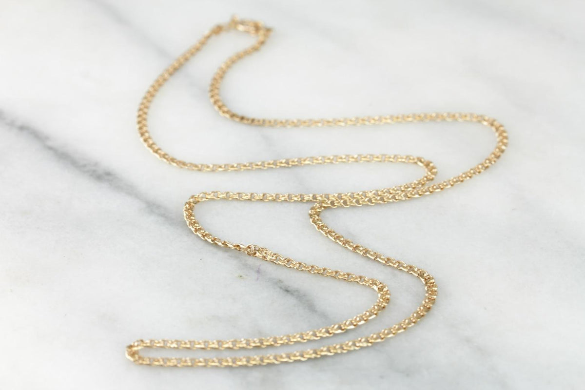 Cadena de eslabones ovalados de oro rosado, plana