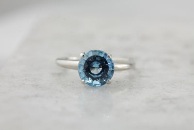 October Sky Engagement: Brilliant Round Blue Topaz Solitaire Ring