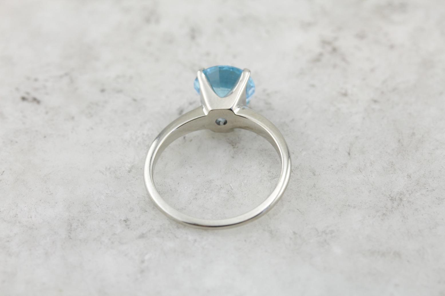 October Sky Engagement: Brilliant Round Blue Topaz Solitaire Ring