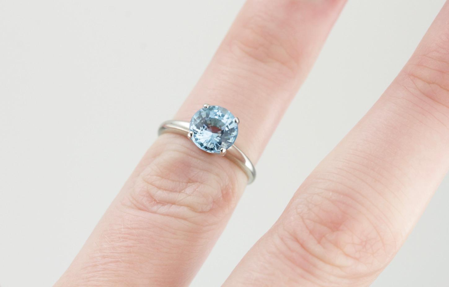 October Sky Engagement: Brilliant Round Blue Topaz Solitaire Ring