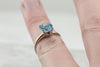 October Sky Engagement: Brilliant Round Blue Topaz Solitaire Ring