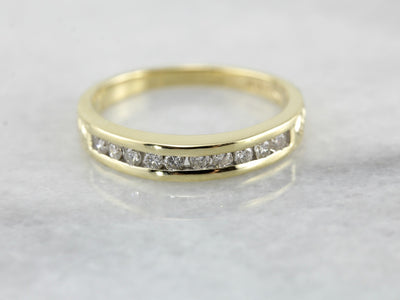 Channel Set Diamond Wedding Band in Polished Yellow Gold