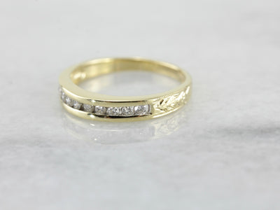 Channel Set Diamond Wedding Band in Polished Yellow Gold