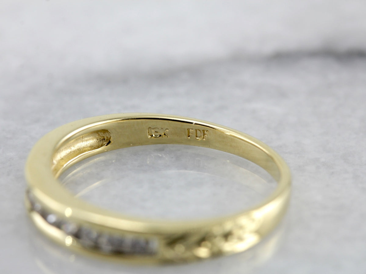 Channel Set Diamond Wedding Band in Polished Yellow Gold
