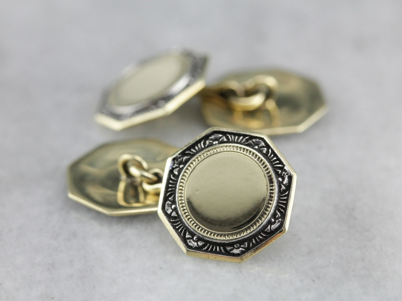 Gemelos Art Déco antiguos de oro verde