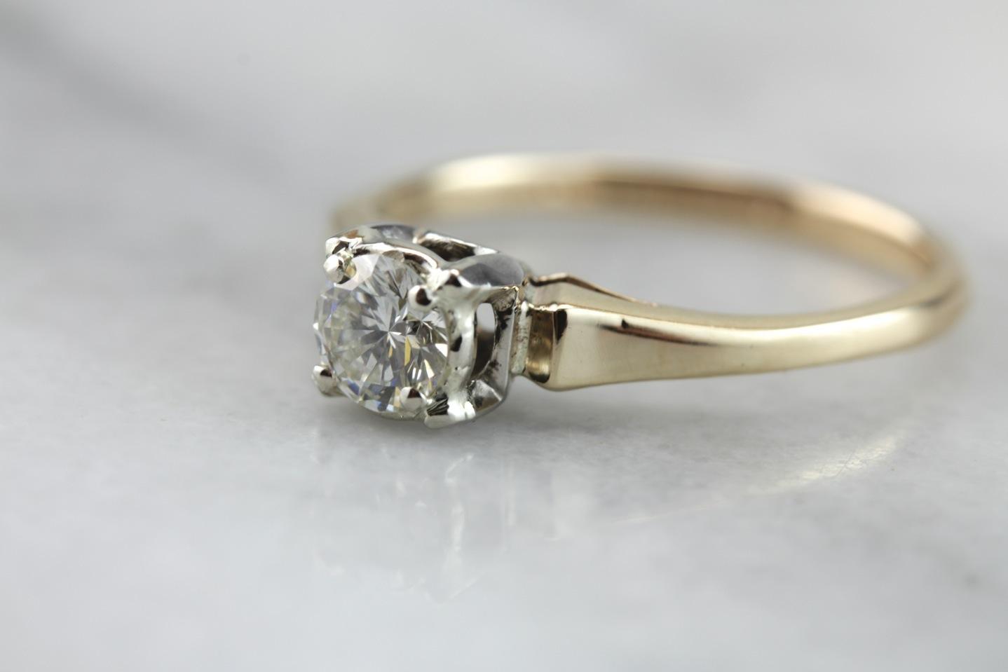 Stylish Simplicity: Retro Era Diamond Engagement Ring