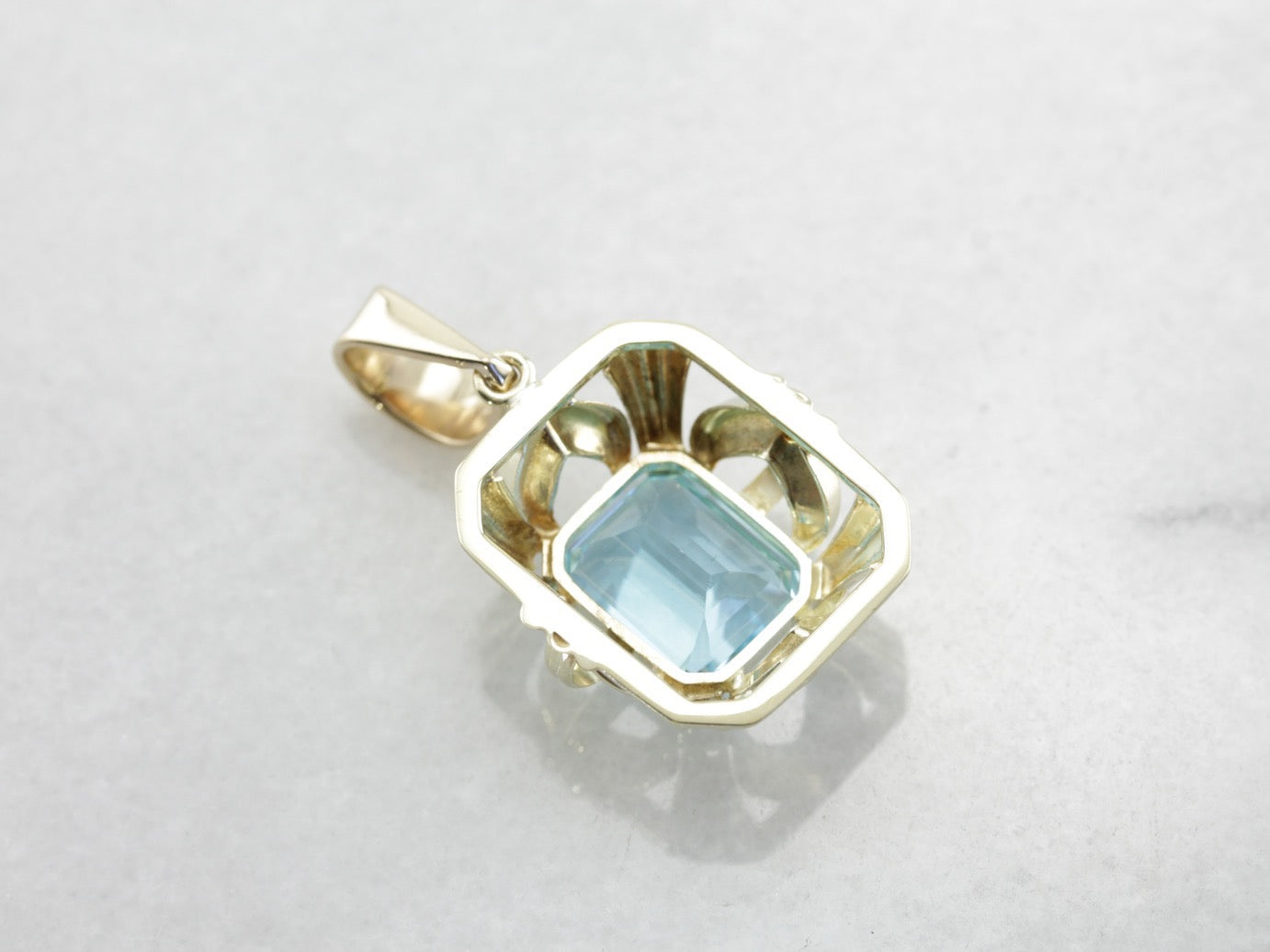 Beautiful and Bold, Blue Topaz Pendant in Yellow Gold