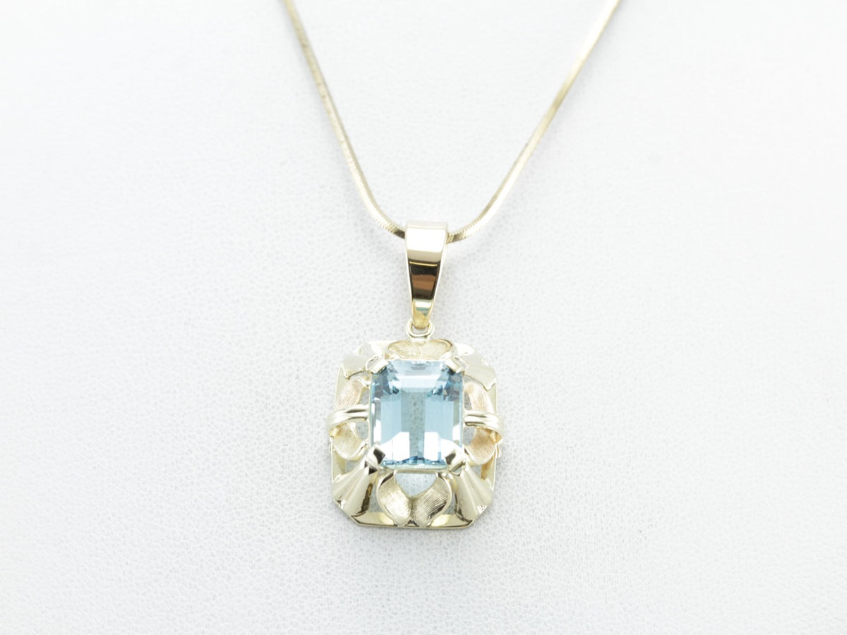 Beautiful and Bold, Blue Topaz Pendant in Yellow Gold