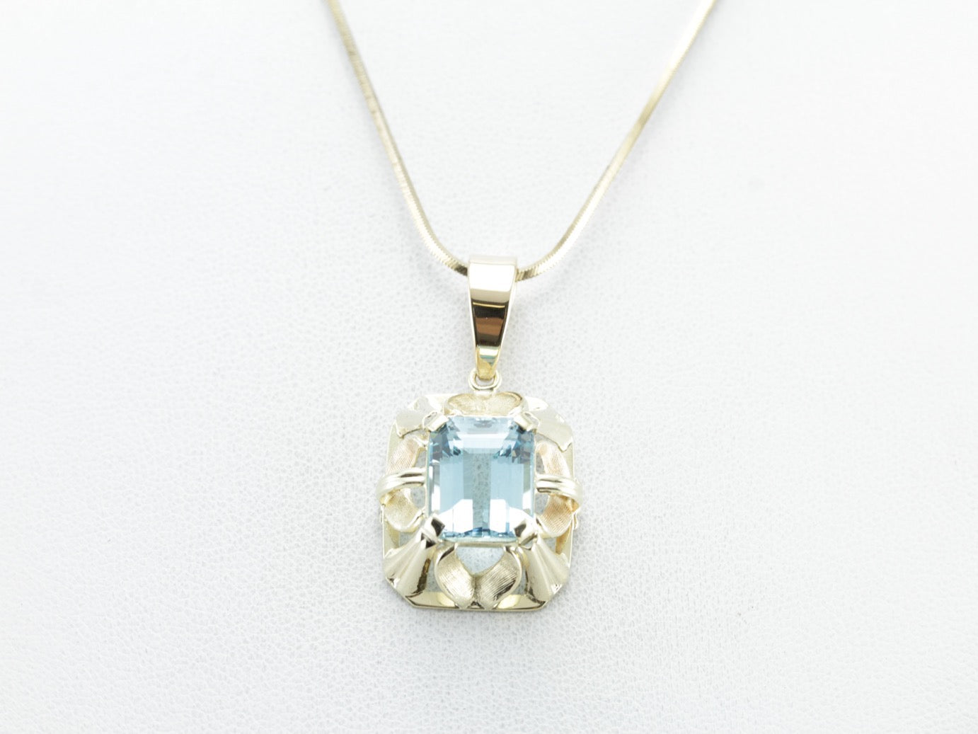 Beautiful and Bold, Blue Topaz Pendant in Yellow Gold
