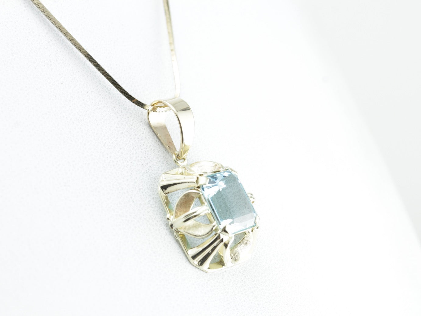 Beautiful and Bold, Blue Topaz Pendant in Yellow Gold