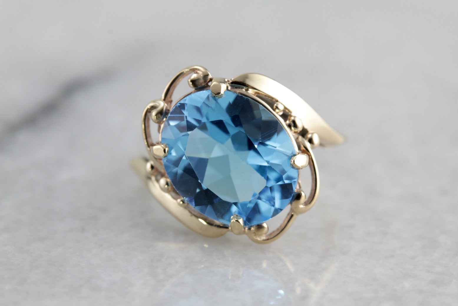 Electric Blue Topaz Gold Cocktail Ring