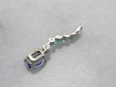 Unusual Pale Blue Sapphire, Emerald and Diamond Accented Pendant