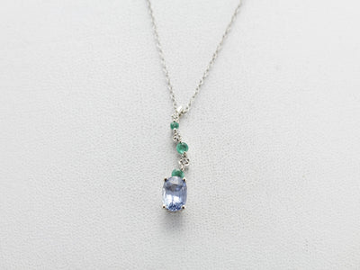 Unusual Pale Blue Sapphire, Emerald and Diamond Accented Pendant