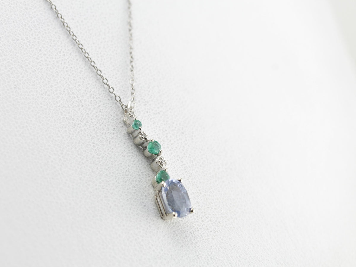 Unusual Pale Blue Sapphire, Emerald and Diamond Accented Pendant