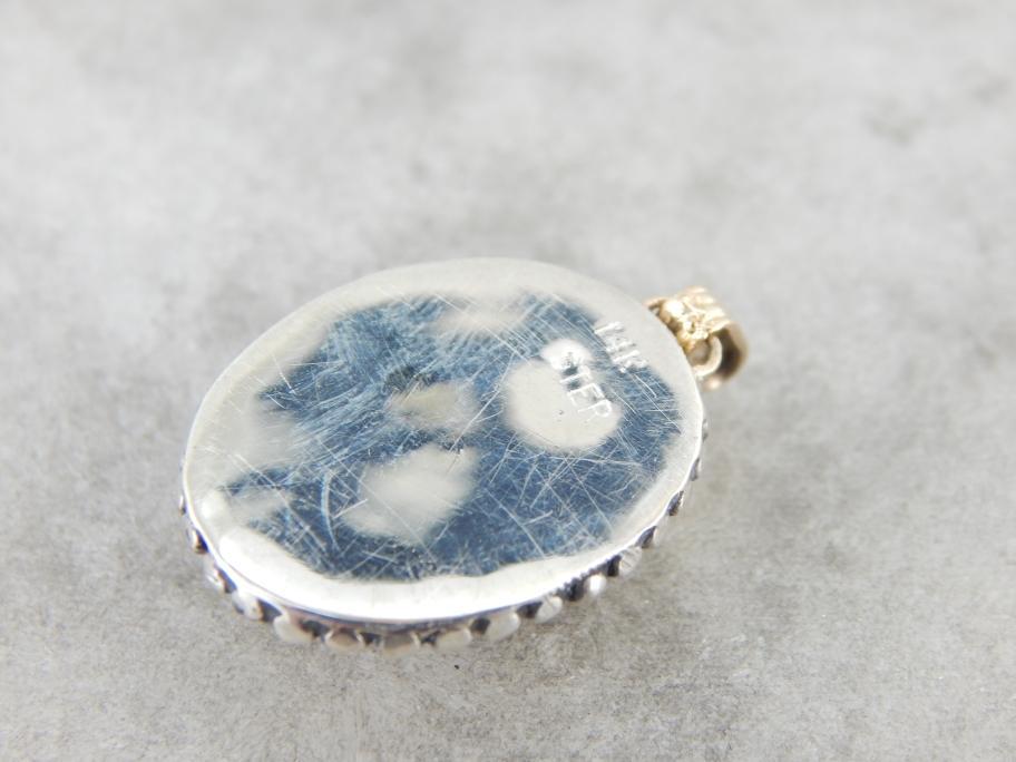 Glittering Orange Sunstone Pendant in Sterling and Gold Frame