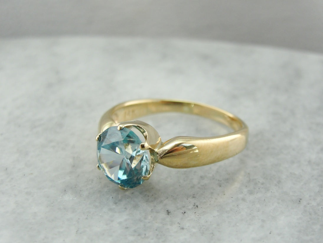 Blue Zircon Cocktail Ring in Modern Yellow Gold