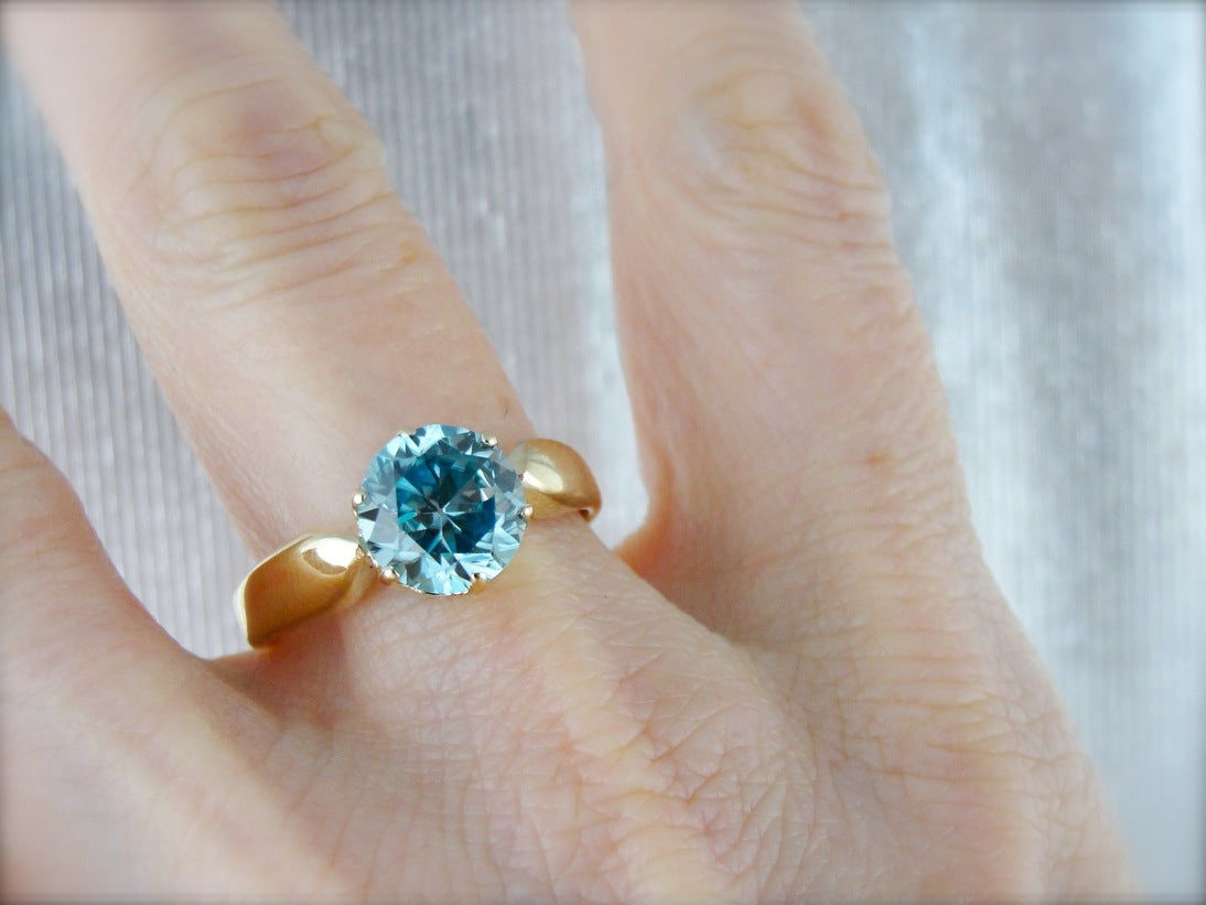 Blue Zircon Cocktail Ring in Modern Yellow Gold