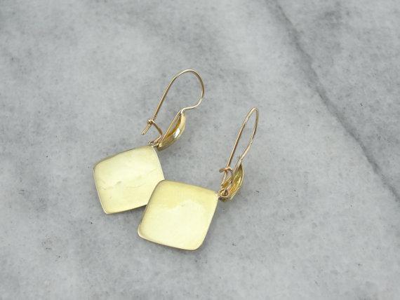 Impresionantes pendientes de gemelos art déco perseguidos