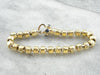 18 Karat Yellow Gold Bracelet with Faceted Links and Decorative Clasp