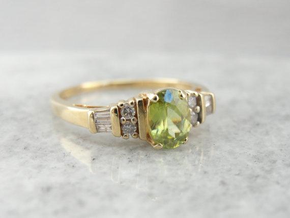 Mint Green Sphene in Modern Diamond Mounting