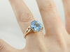 Brilliant Blue Topaz, Accented Split Shank Solitaire Ring in Yellow Gold