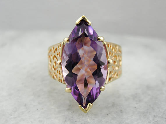 Large Marquise Cut Amethyst in Modern Filigree Wide Band Set in Yellow Gold