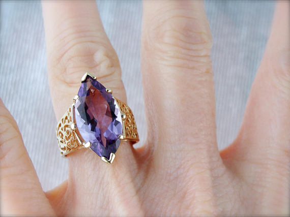 Large Marquise Cut Amethyst in Modern Filigree Wide Band Set in Yellow Gold