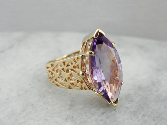 Large Marquise Cut Amethyst in Modern Filigree Wide Band Set in Yellow Gold
