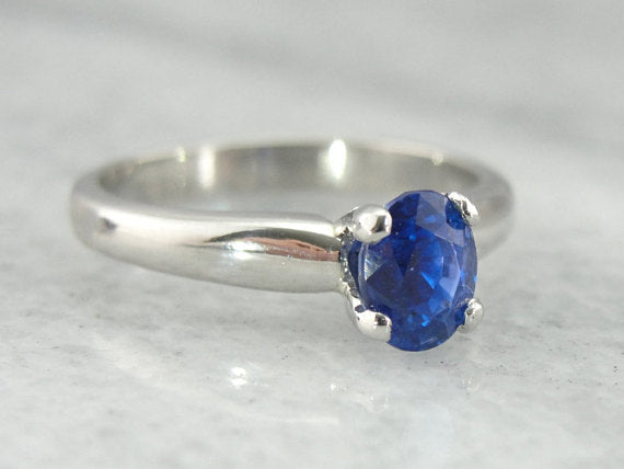 Exceptional Cobalt Blue Ceylon Sapphire in a Traditional Platinum Engagement Ring, Benchmark Quality Stone