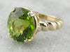 Bold Peridot and Curvaceous Gold Statement Ring