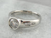 Stunning Bezel Set Diamond Engagement Ring in Platinum Settings
