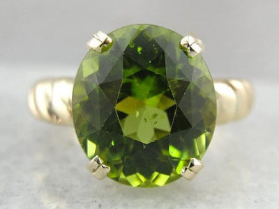 Bold Peridot and Curvaceous Gold Statement Ring