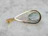 Balanced, Simple and Substantial Aquamarine and Gold Pendant