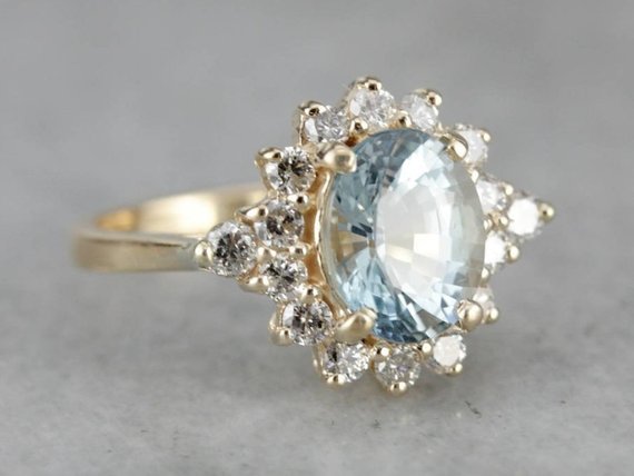 Glittering Aquamarine Diamond Halo Ring