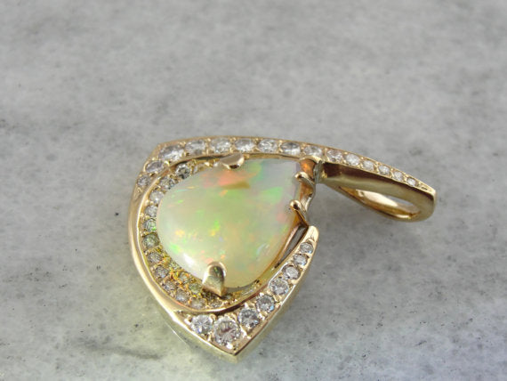 Ethiopian Opal Pendant in Modernist Gold and Diamond Frame
