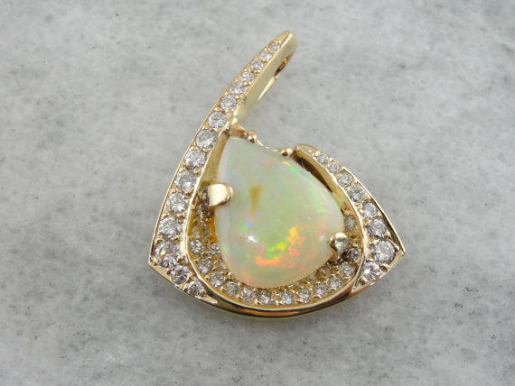 Ethiopian Opal Pendant in Modernist Gold and Diamond Frame