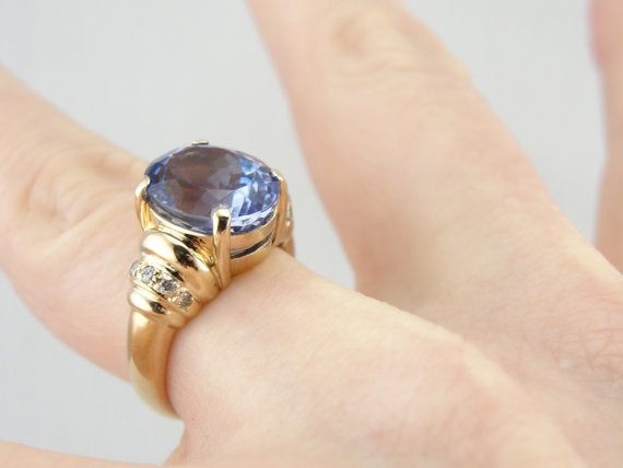 Indigo Purple Tanzanite and Diamond Ring in Yellow Gold