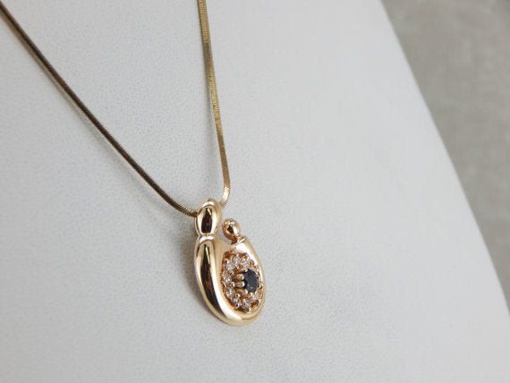 September Baby, Sapphire and Diamond Mother and Child Pendant