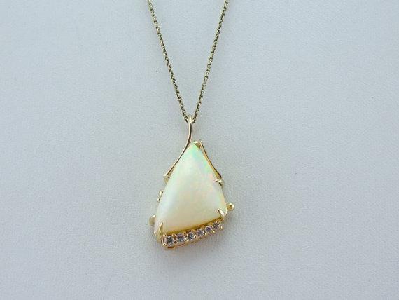 Ethiopian Opal Pendant with Diamond Accents