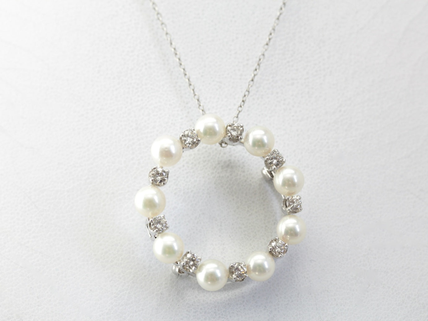 Elegant Vintage Pearl and Diamond Circle Pin