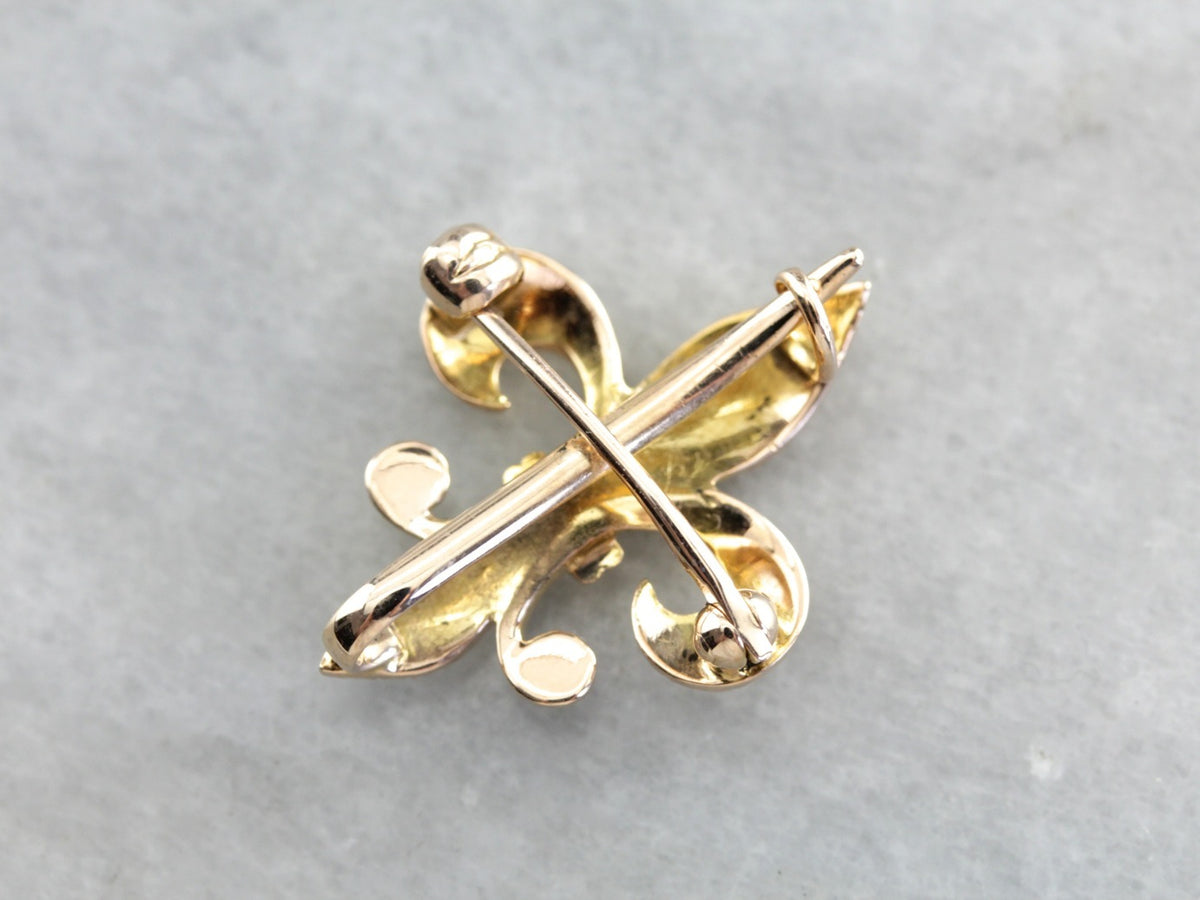 Broche de oro antiguo con flor de lis