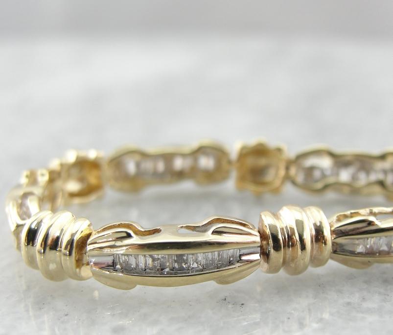 Baguette Channel Diamond Bracelet with Gleaming Gold Accents
