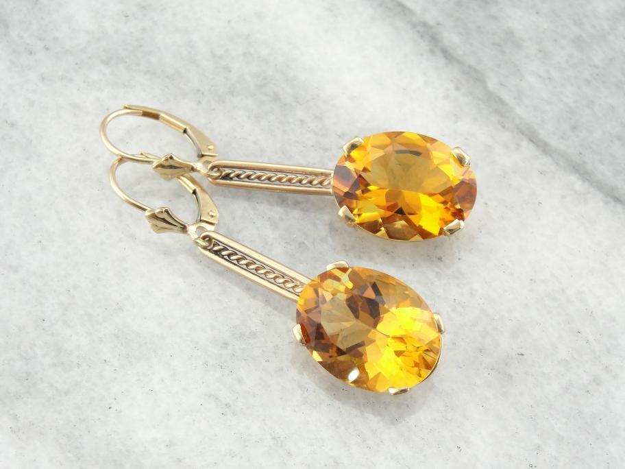 Hermosos aretes colgantes sustanciales de oro rosa y citrino