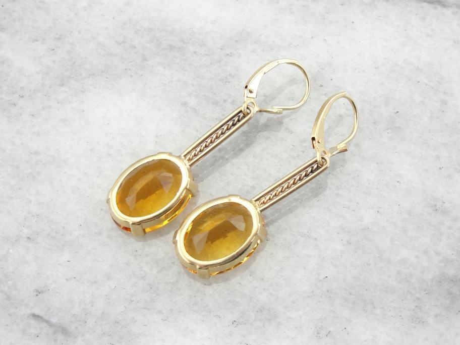 Hermosos aretes colgantes sustanciales de oro rosa y citrino