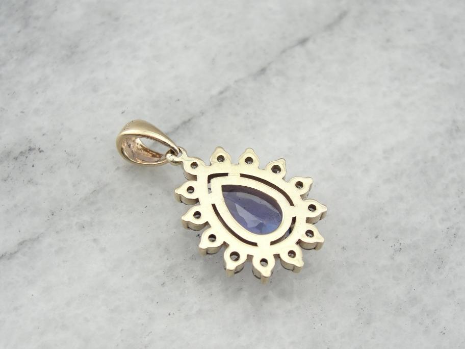 Brilliant Tanzanite Teardrop Pendant with Diamond Halo