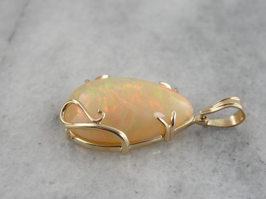 Ginger Opal with Apricot Highlights, Golden Mounting