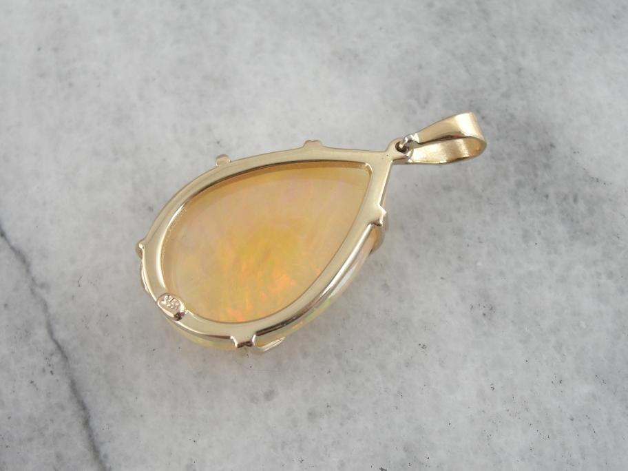 Ginger Opal with Apricot Highlights, Golden Mounting