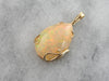 Ginger Opal with Apricot Highlights, Golden Mounting