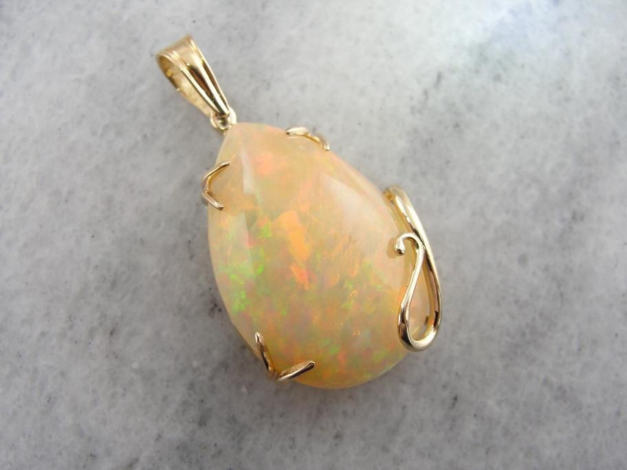 Ginger Opal with Apricot Highlights, Golden Mounting