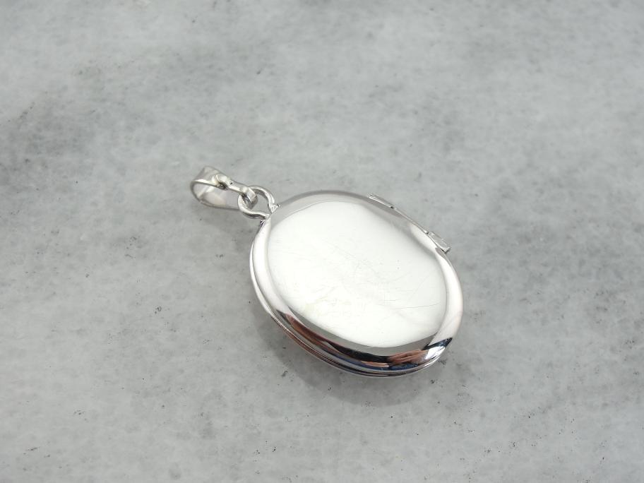 Sterling and Gold Locket Engraved LA